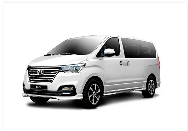 White passenger van for Epic Adventures group tours